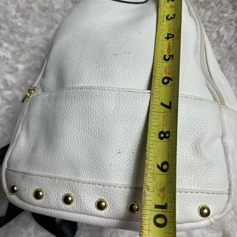 Juicy Couture white faux leather small backpack  black straps &gold tone studs